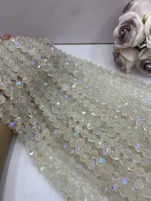Coated milky white crystal diamond cut 12mm, 38cm long chain.