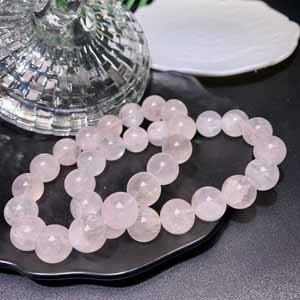 Jelly-like rose quartz (12.4mm) single wrap. Rose quartz bracelet.