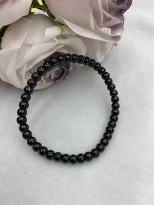 Black spinel 4-6mm wheel-shaped bracelet.