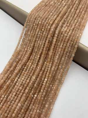 Orange moonstone sugar cube 2x2mm, long chain 38cm.