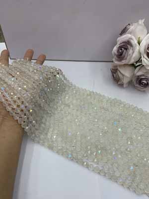 Coated milky white crystal diamond cut 8mm, 38cm long chain.