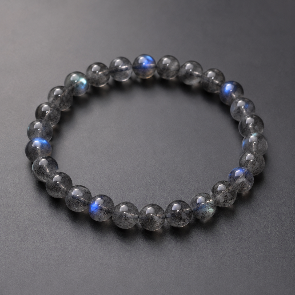 Black-bodied gray moonstone bracelet (7mm)
